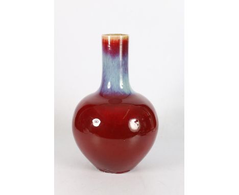 Large 19th century sang de boeuf vase of bulbous baluster form, the neck with blue purple glaze band blending into the red of