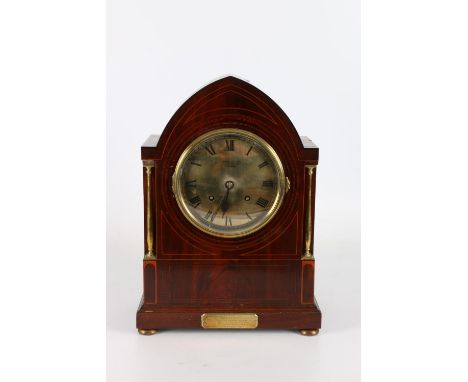 Russells Limited of Liverpool bracket or mantel clock in the Gothic style within mahogany arch top case, the works stamped "J