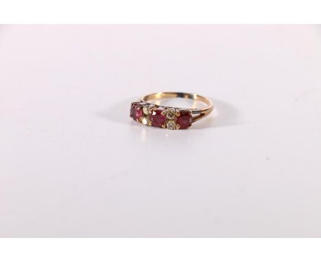 18ct gold ruby and diamond ring, ring size M, 2.6g.Band marked '18'.  Unsure of colour/clarity.  Ruby' is 3mm x 3mm.