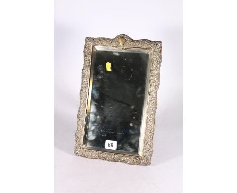 Victorian silver easel frame with allover repousse floral decoration by James Deakin &amp; Sons (John &amp; William F Deakin)