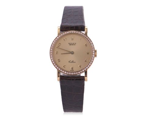 A lady's Rolex Cellini wristwatch, manually crown wound movement, yellow metal case stamped 18K, diamond bezel surround, refe