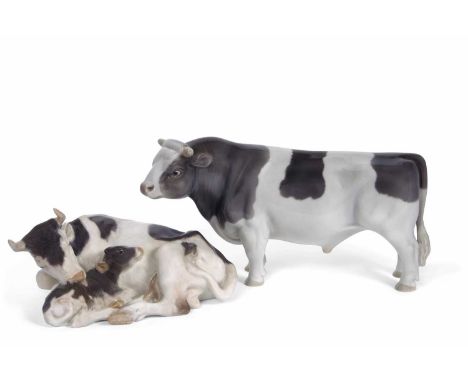 A Royal Copenhagen model of cow and calf, factory mark to base and model 800 together with a Royal Copenhagen model of a bull
