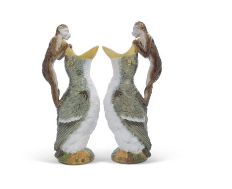 An unusual pair of  19th century ewers modelled as ducks with the handles modelled as monkeys by William Brownfield, 35cm hig