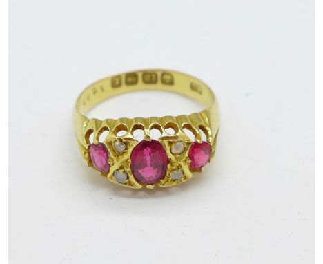 An 18ct gold, ruby and diamond ring, Birmingham 1918, 3.4g, M