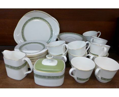 A Royal Doulton Rondelay twelve setting tea service, two cake plates, twelve cups, saucers and side plates