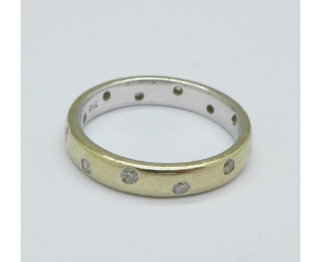 An 18ct gold and diamond ring, 3.6g, K