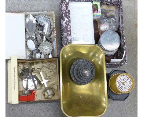 A set of kitchen scales and weights and three boxes of pastry cutters, etc.