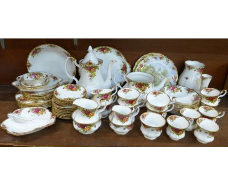 Sixty-three pieces of Royal Albert Old Country Roses, teapot lacking lid