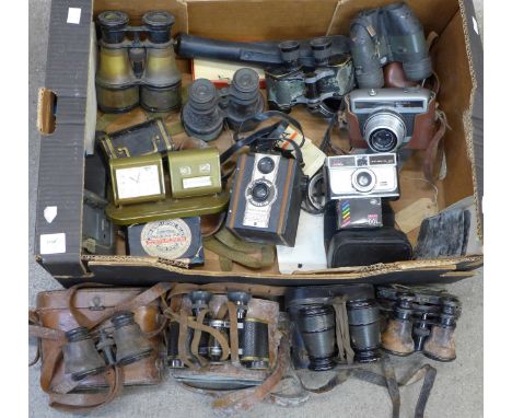 Vintage cameras and binoculars, including Goerz Berlin, Bausch & Lomb, several pairs of field glasses and a Europa desk timep