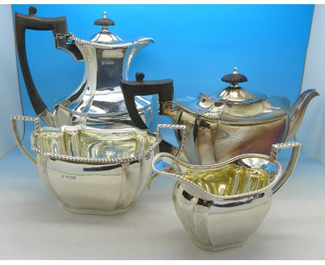 A silver four piece tea and coffee service, Sheffield 1902, Hammond, Creake & Co., 1563g, 50oz