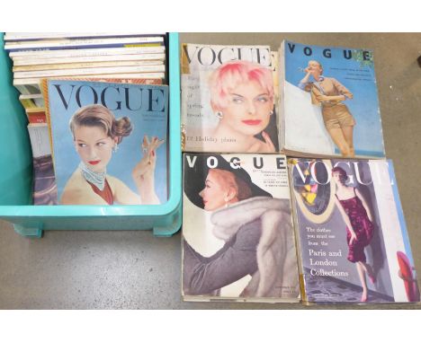 A collection of Vogue and other fashion magazines, comprising nineteen vintage Vogue magazines and later magazines including 