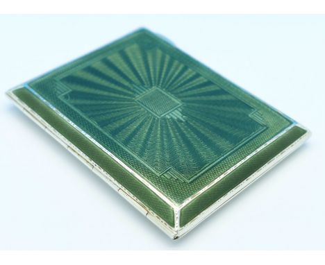 A silver and enamel cigarette case