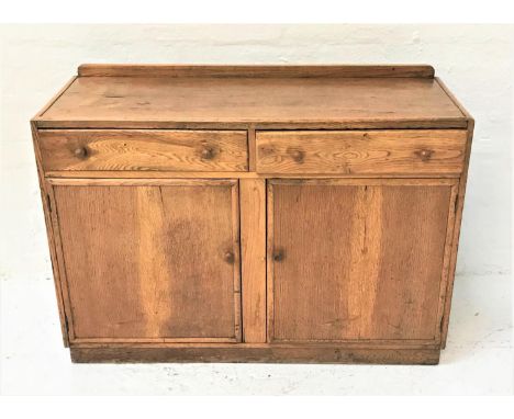 LIGHT OAK SIDEBOARDwith a raised back above two frieze drawers with two cupboard doors below, standing on a plinth base, 122c