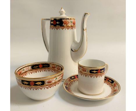 STAFFORDSHIRE CHINA COFFEE SERVICEdecorated with terracotta flowers and navy blue panels with roses and gilt highlights, on a