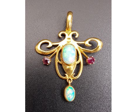ART NOUVEAU RUBY AND OPAL SET FIFTEEN CARAT GOLD PENDANTthe central oval cabochon opal flanked by a ruby to each side, all in