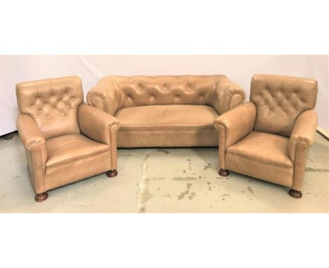 CHESTERFIELD SUITEcomprising a button back sofa with scroll arms and two button back armchairs with scroll arms, all standing