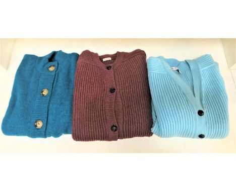 THREE HEAVY LAMBSWOOL CARDIGANSof various designs, in light blue, teal and orange/brown (3) 