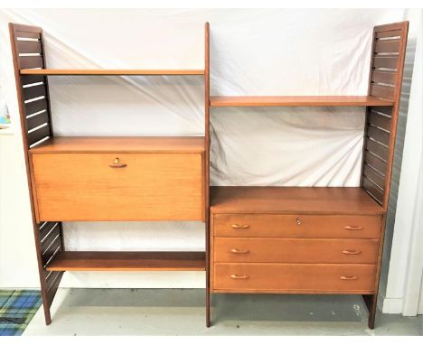 1970'S LADDERAX TEAK MODULAR WALL UNIT comprising three ladder style uprights, a bureau, three drawer chest and three shelves