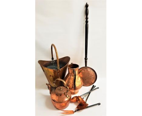SELECTION OF VINTAGE COPPER WAREincluding a helmet coal scuttle with a swing handle, warming pan with a turned handle, range 