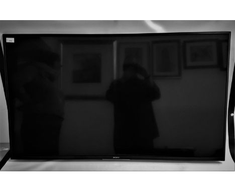 SONY BRAVIA COLOUR TELEVISIONmodel KD-49XF7596, with a 49" screen, HDMI ports, wall mounting bracket and remote control 