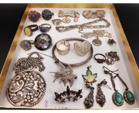 SELECTION OF SILVER JEWELLERYincluding various stone set rings, a pierced floral decorated pendant on chain, a Highland Light