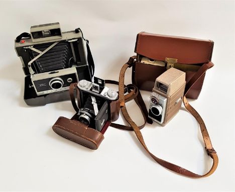 SELECTION OF PHOTOGRAPHIC CAMERASincluding a cased Polaroid Automatic 330 Land Camera, a cased Ensign Selfix 1620 and a cased