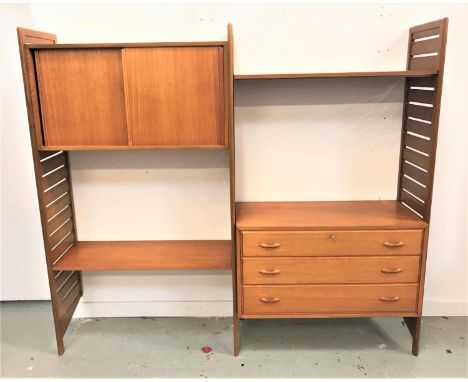1970'S LADDERAX TEAK MODULAR WALL UNITcomprising three ladder style uprights, a cupboard with a pair of sliding doors, three 