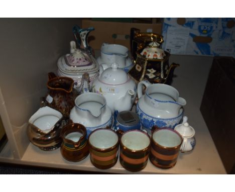 A collection of vintage ceramics including imari palette teapot and trivet, cups and saucers and more.