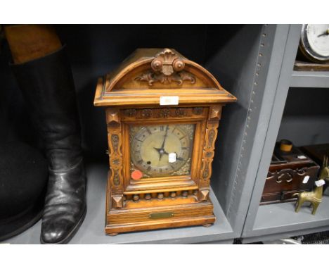 A 19th Century German carved mantel clock