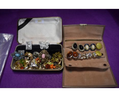 A selection of costume jewellery earrings and brooches including ceramic, simulated pearl etc