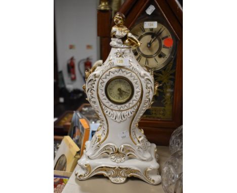 A ceramic mantel clock made in Italy with a German movement