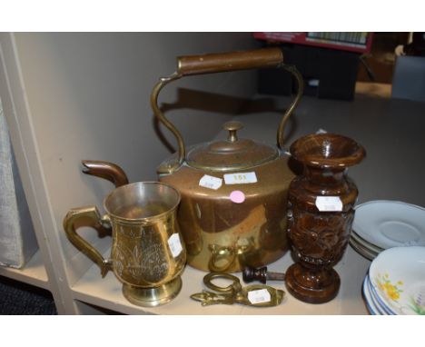 A vintage copper kettle, a tankard and carved wood vase.