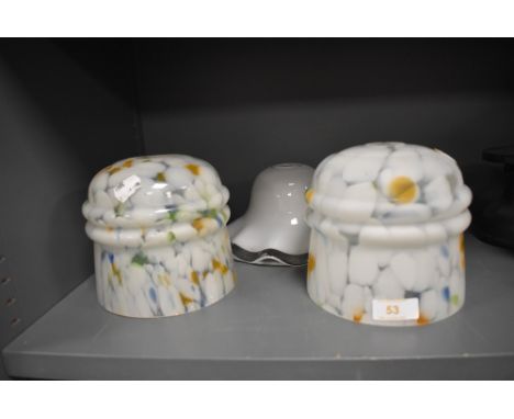 A selection of art deco lamp shades including a near pair of mottled and pressed form and a similar example