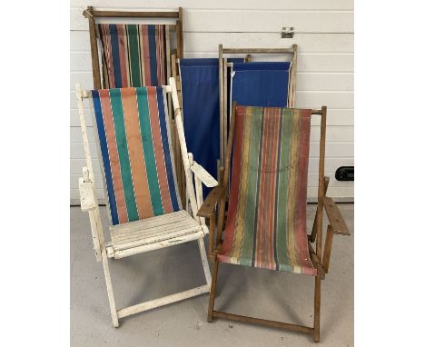 5 vintage deckchairs. All wooden framed,1 with wooden slated seat. Material to large striped chair a/f. 