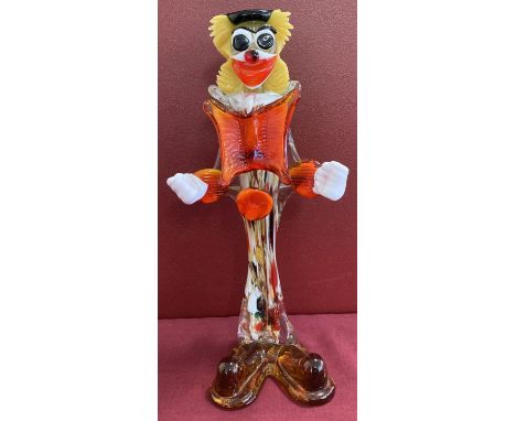A vintage Murano glass clown figure in red, yellow and brown colourway.  Approx. 34 cm tall.