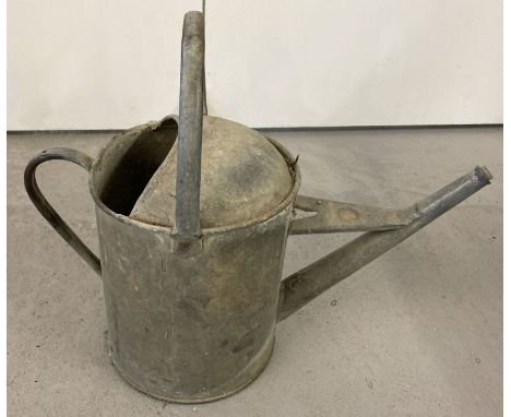 A vintage galvanised 2 gallon Beldray watering can.  