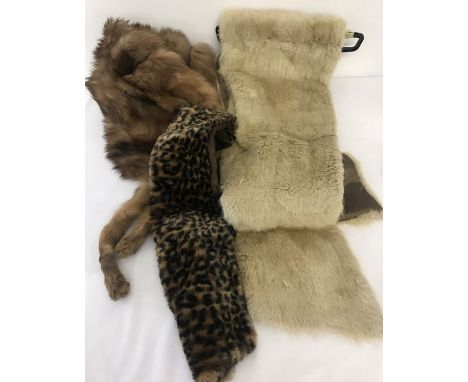2 vintage fur stoles; one white, one brown together with a faux fur leopard print scarf.  