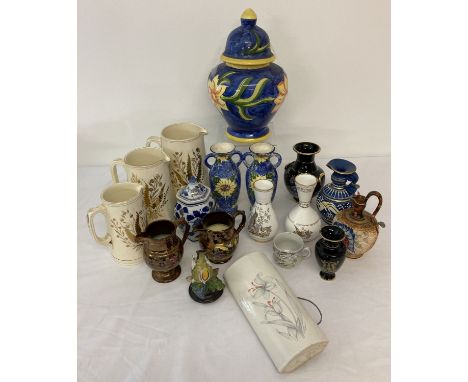 A box of mixed ceramic lidded jars, vases and jugs. To include a set of 3 graduating jugs with gilt decoration. 