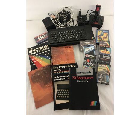 A 1980's Sinclair ZX Spectrum+ computer bundle to include power leads, manuals, joy stick &amp; games. Games to include: Rasp
