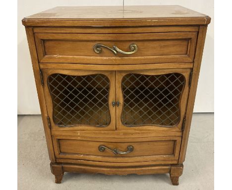 A vintage R Way furniture solid wood 2 door, 2 drawer cabinet with wired panels to door fronts.  Approx. 75cm tall x 61cm wid