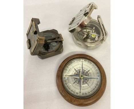 3 assorted compasses. A glass dome topped desk compass, a square shaped metal compass marked 'Kelvin &amp; Hughes, London, 19