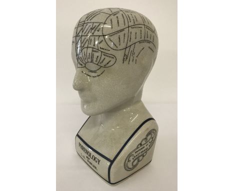 A ceramic L.N. Fowler phrenology head, with crazed glaze effect.  Approx. 24cm tall.