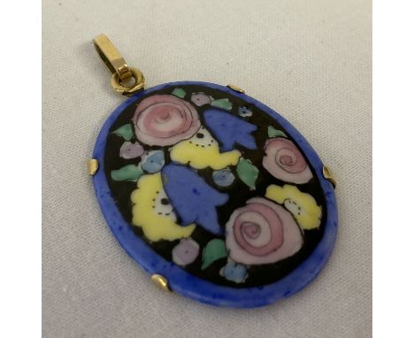 A floral painted ceramic panel pendant with 18ct gold fixing mount and bale. Small chip to reverse of ceramic panel, indistin