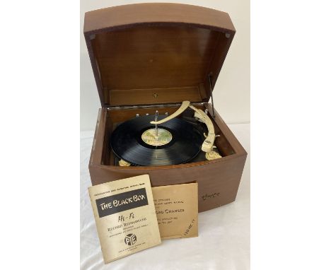 A vintage wooden cased "The Black Box" record player by Pye with Garrard automatic record changer. Complete with original Pye