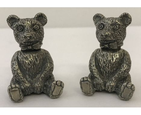 A vintage pewter teddy bear cruet set.  Total height approx. 5cm.