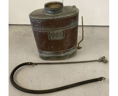 A "The Four Oaks" vintage copper backpack sprayer.  Approx. 44cm tall.