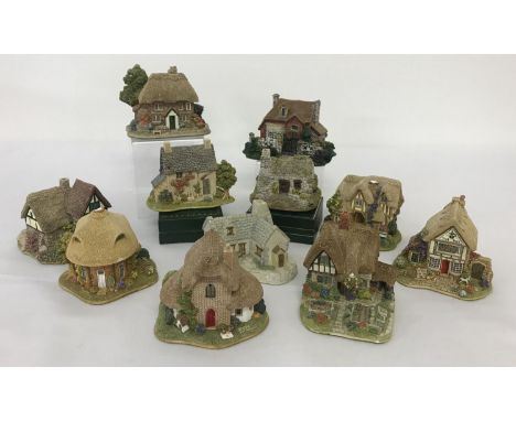 A collection of 9 Lilliput Lane figurines (some a/f) together with 2 others. Lot includes: A Coven of Witches, Afternoon Tea,