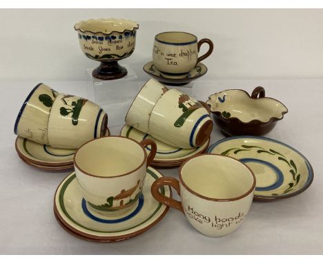 A collection of vintage Torquay motto ware china items. To include 6 cups &amp; saucers and 2 decorative bowls. 