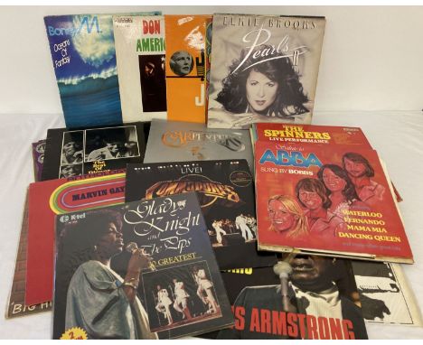 A collection of pop and easy listening vintage LP vinyl records. Artists include: Don Mclean, Boney M, The Carpenters, Peggy 