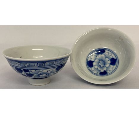 A pair of Oriental ceramic blue and white stem cups, with ring marks to base.  Approx. 8.5cm diameter x 4cm tall.